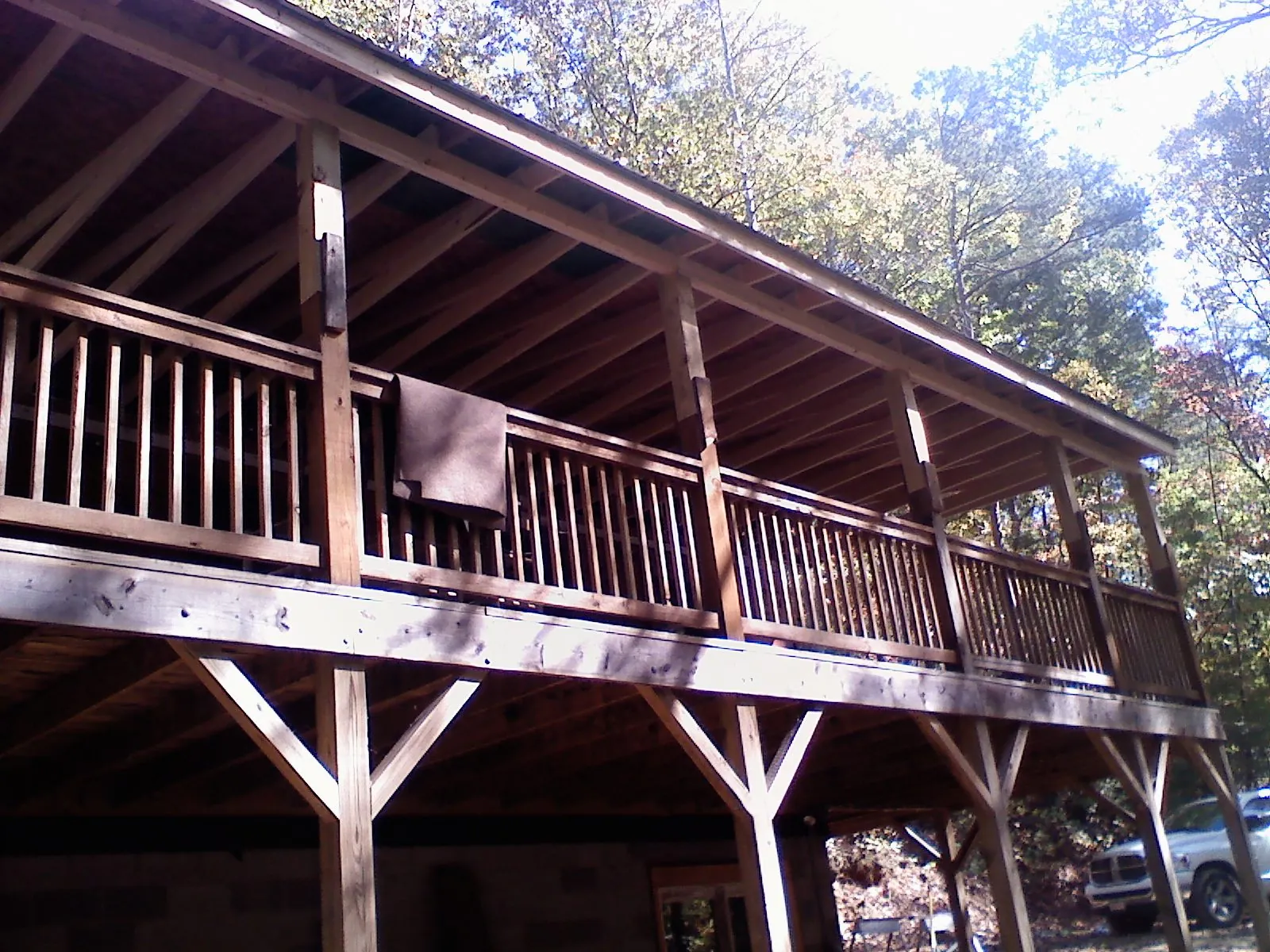 Timber framing under a new elevated porch and deck — Roof Leak Repair in Ypsilanti by Roofing Brothers